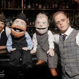 vintage style magicians with puppets