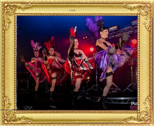 Cabaret dancers kick legs up Cancan dancing on stage from our entertainment agency London