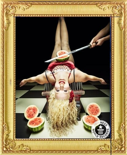 Female freak show style bed of nails vintage circus acts for hire London and Brighton.