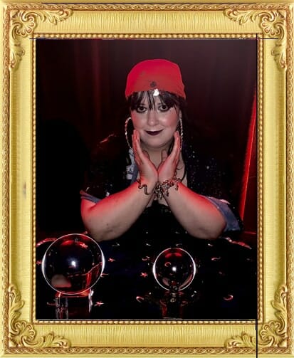Unusual corporate party entertainment in London and Brighton, fortune teller poses in traditional costume