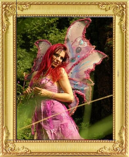 cabaret dancer fairy part of our specially created entertainment service poses in pink wings and dress