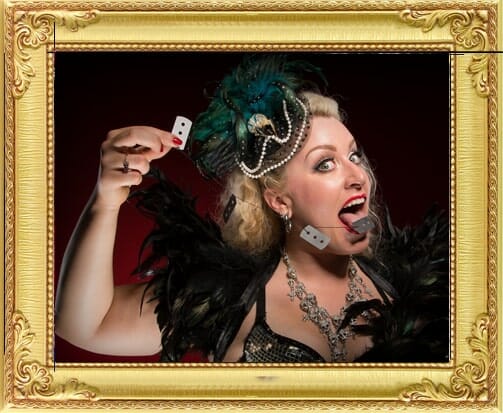 pretty victorian female magician for hire in London and Brighton swallows razorblades at London theme show