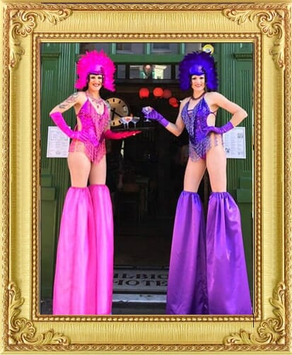 Showgirl stilt-walking performers London, for hire in Brighton & London handing out drinks