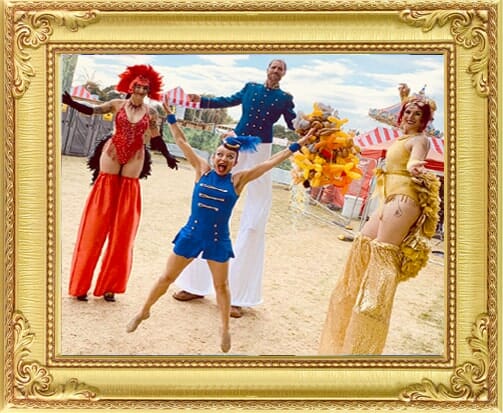 Full-service event management London with stilt-walking vintage circus acts and jumping ring mistress.