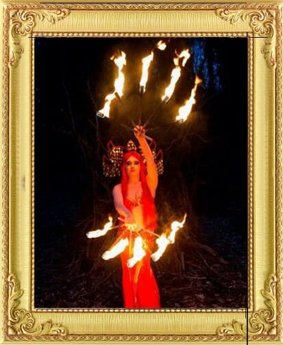 entertainers for hire in Brighton and London, fire act with fire fans and long red dress