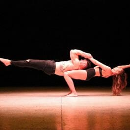 adagio and acro balance act on stage at corporate event
