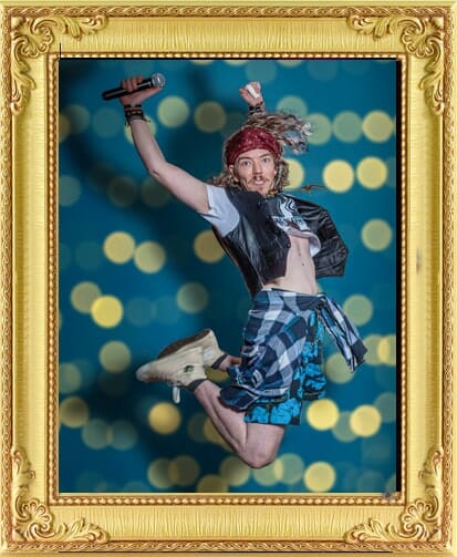 cabaret singer from our event management & entertainment agency London jumps high in grunge outfit