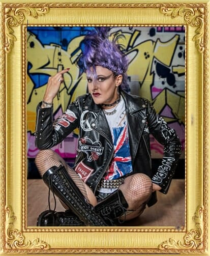 Punk performer poses with purple mohawk for bespoke unique entertainment in London and Brighton.