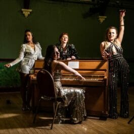 all female comedy singing group at a London venue
