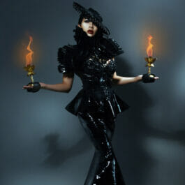 Burlesque dancer latex fire performer