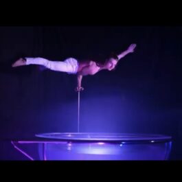 hand balance acrobat over water in Brighton and london