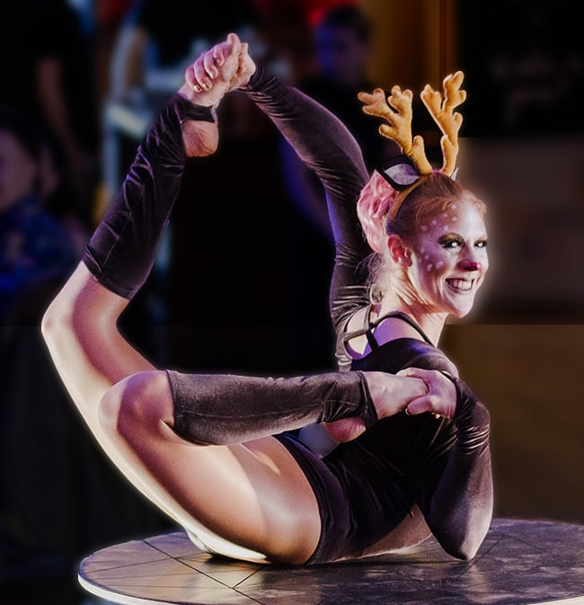 Unique christmas party entertainment contortionist in London with cute reindeer act